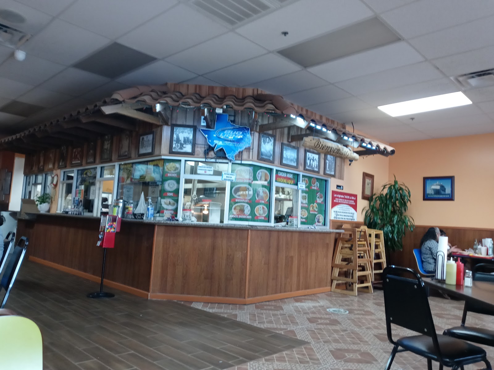 The order counter inside Tacos La Bala on Bellaire Blvd